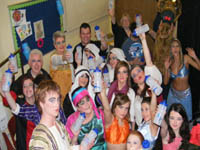 Pictured with their NI Water bottles is the cast of Ali Baba and the Four Tea Leaves aka Whitehead Theatre Group | NI Water News